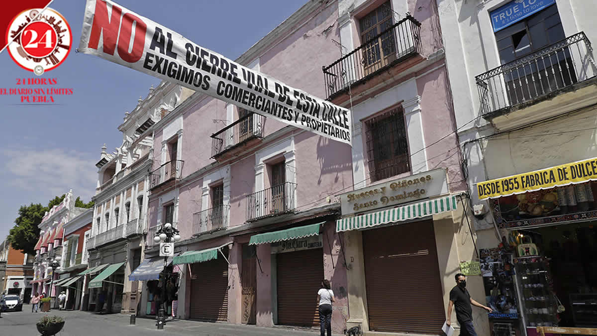 Rechazan comerciantes cierre de la calle de los dulces